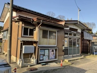 外壁改修前の店舗の外観